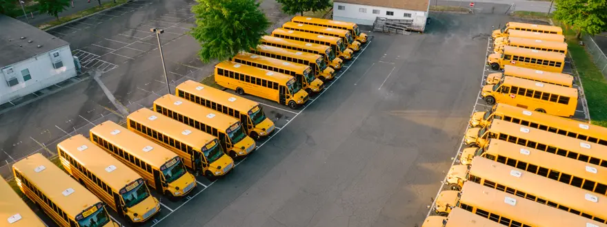 School bus fleet parked during summer break